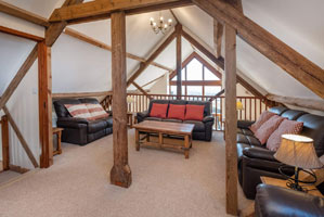 Galleried sitting room overlooking kitchen